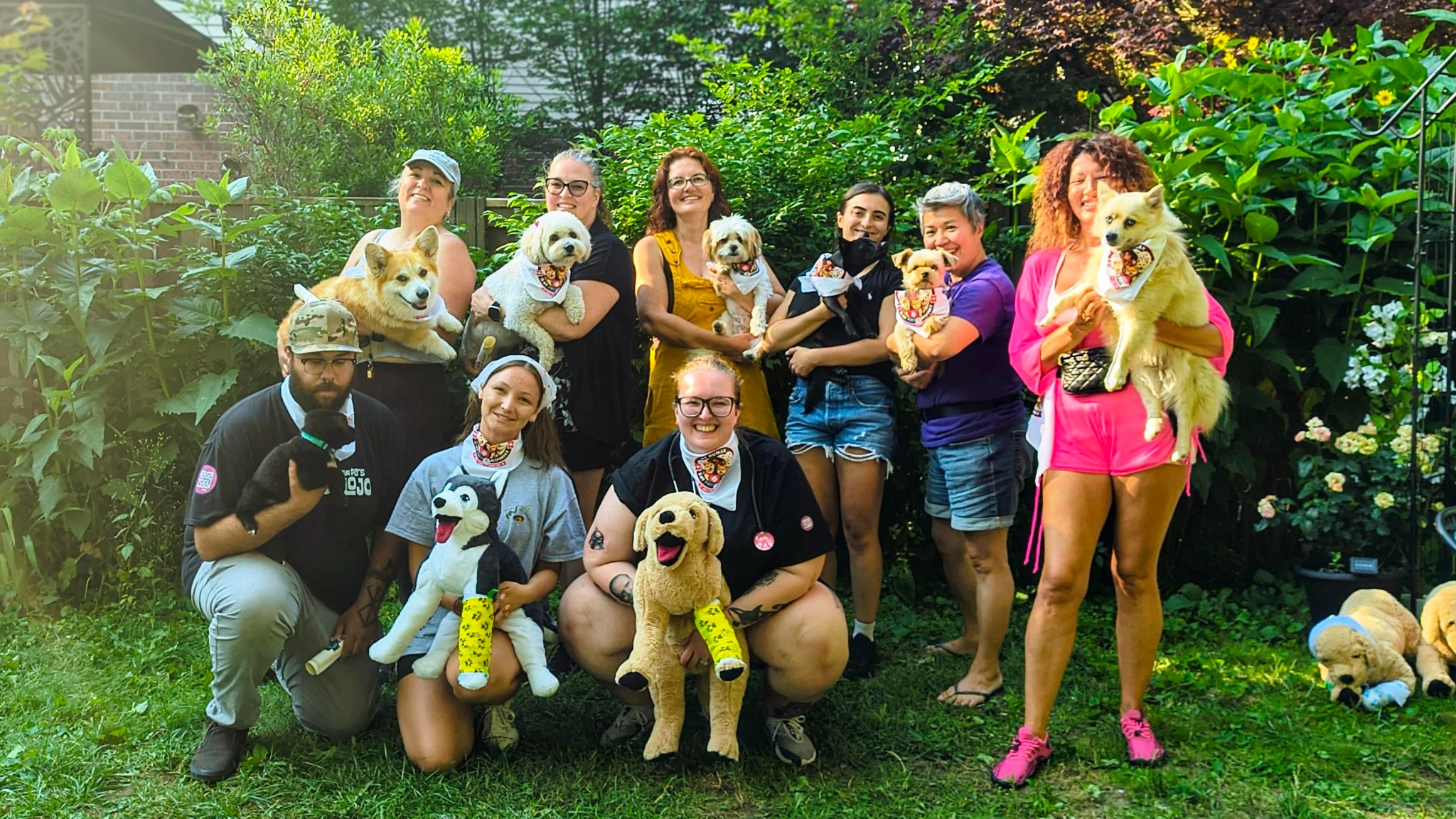 Chaos N Kisses canine first aid class graduates with their dogs and practice mannequins